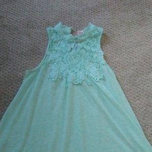 I am selling a tell light weight shirt